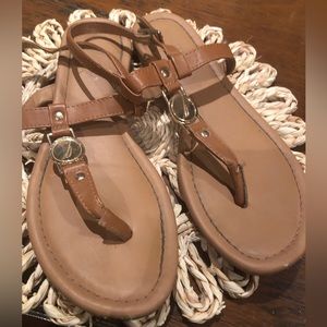 Women’s brown thong flip flop sandals with side buckle